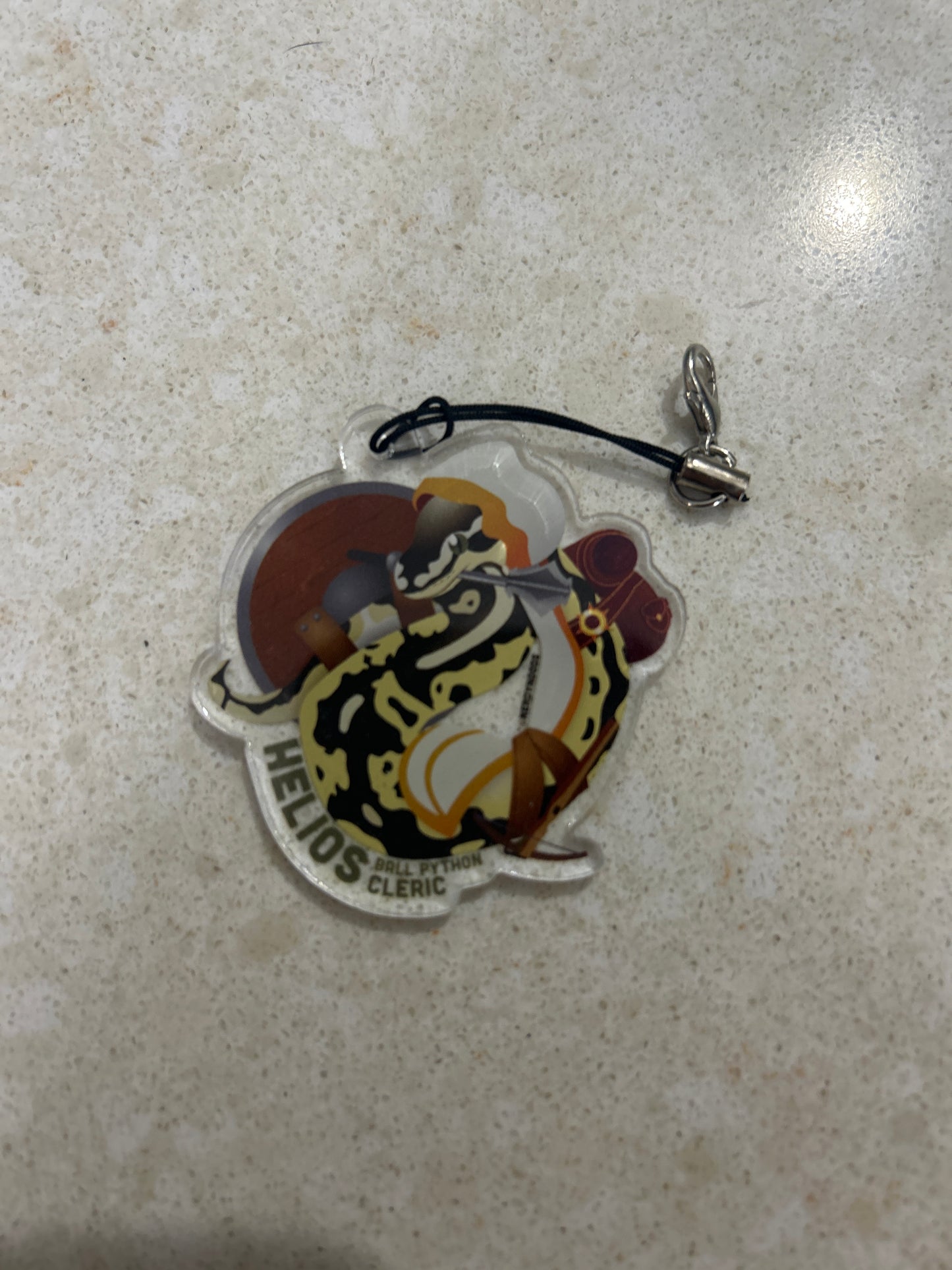 Helios The Cleric Charm - Taz and Jason
